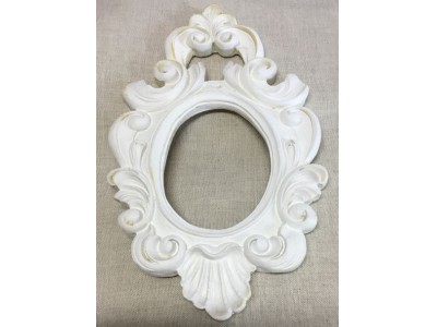 CORNICE ovale con arabeschi e fregi